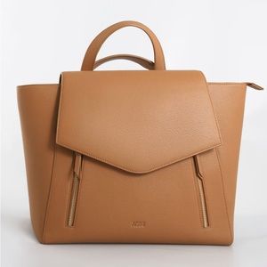 Brand new Agiki convertible backpack purse.